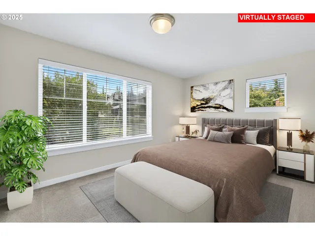 a bedroom with furniture and a window