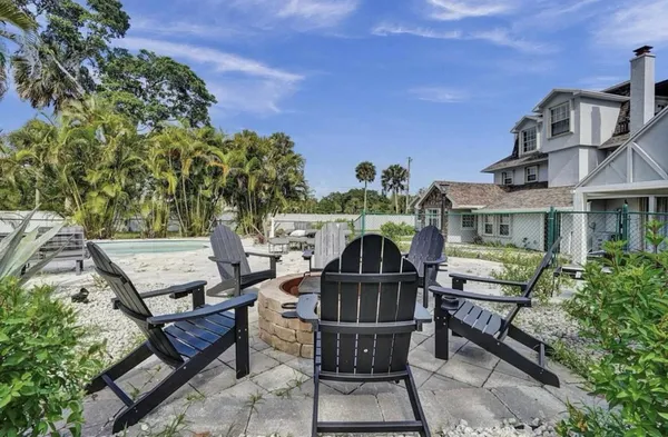 a view of a patio in backyard