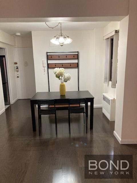 210 East 36th Street, Unit 5E Manhattan, NY 10016 - Photo 3 of 12 a dining room with furniture and window