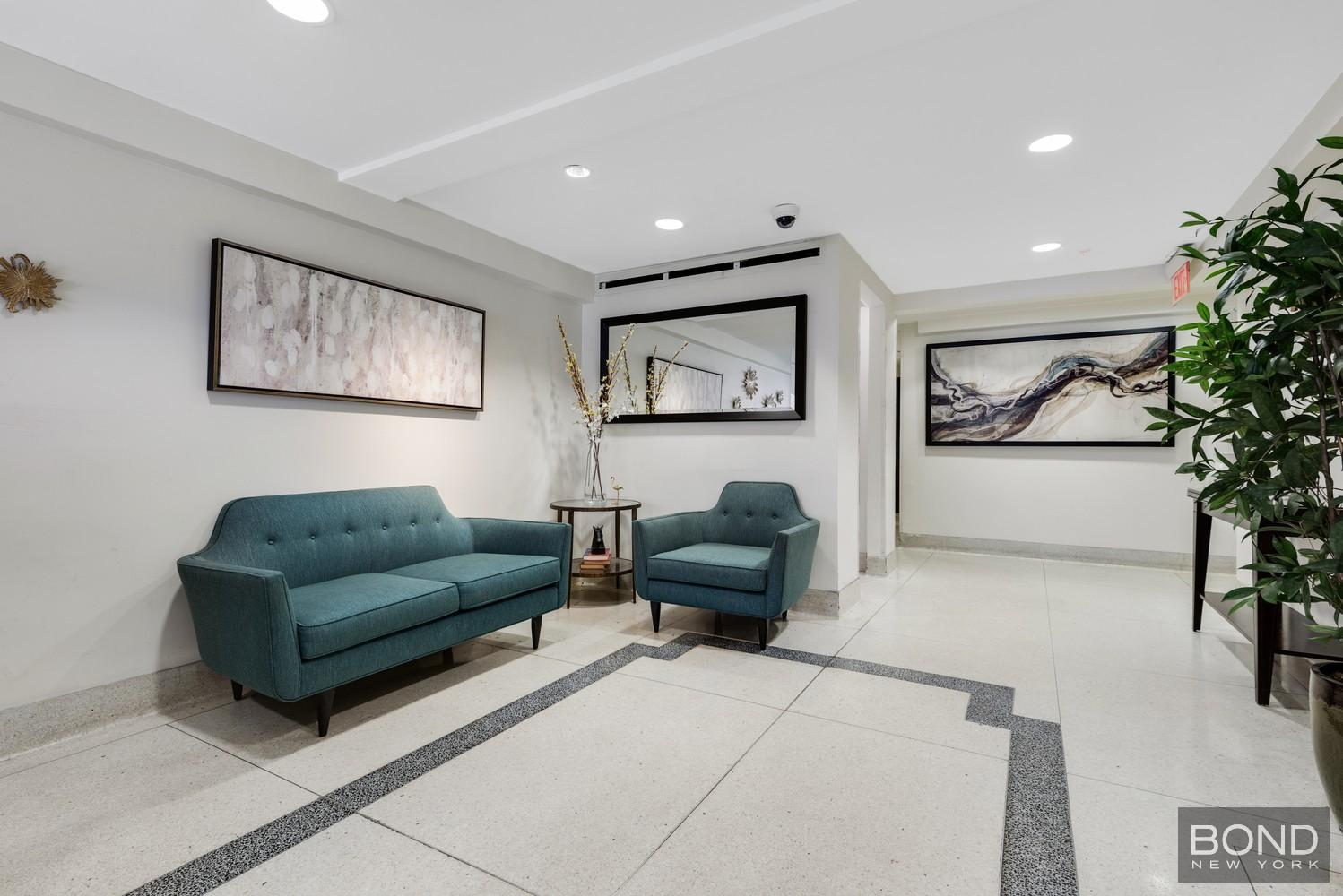 210 East 36th Street, Unit 5E Manhattan, NY 10016 - Photo 10 of 12 a living room with furniture and a potted plant