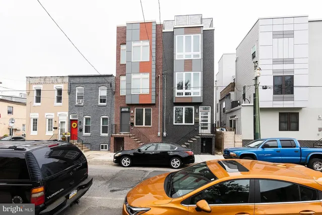a view of a car park in front of a building