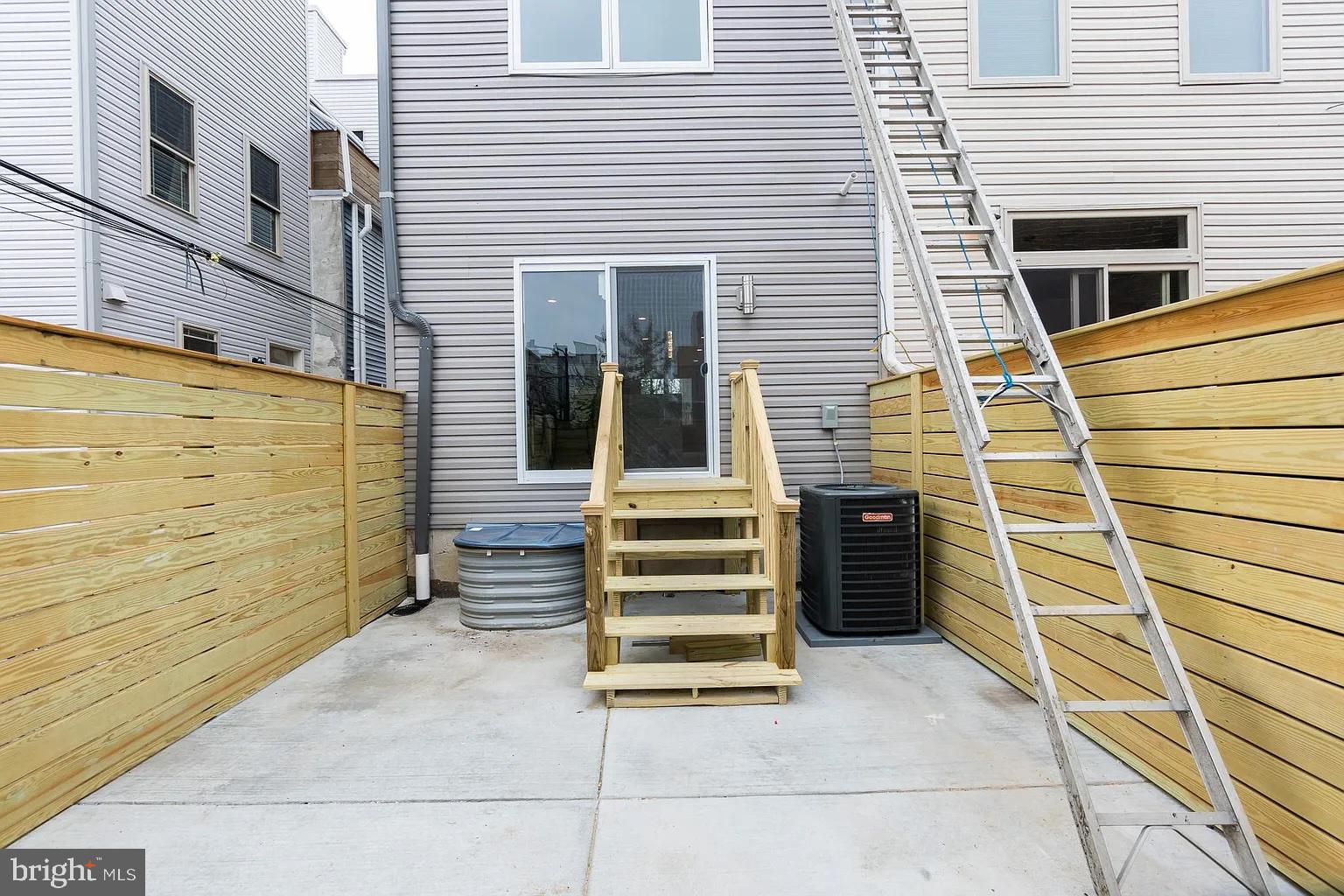 2055 Tasker Street Philadelphia, PA 19145 - Photo 11 of 40 a front view of a house with a window