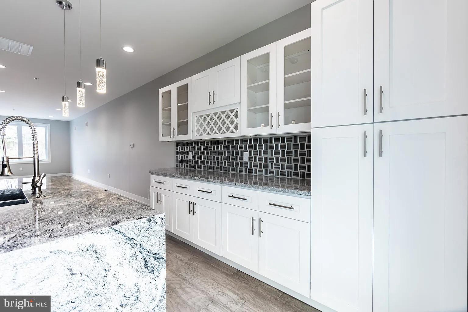 2055 Tasker Street Philadelphia, PA 19145 - Photo 8 of 40 a bathroom with a sink and a mirror