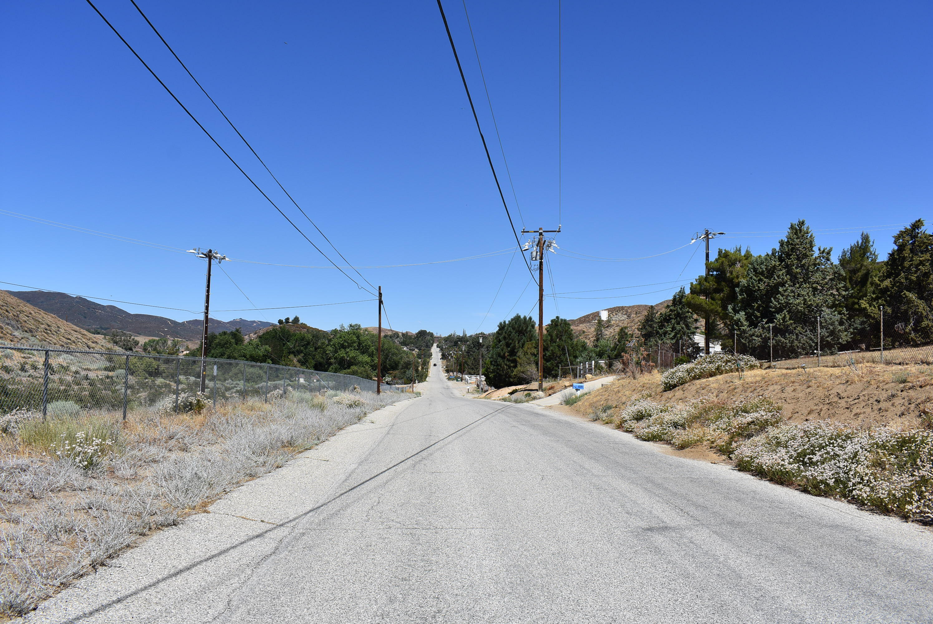 Northside Drive Palmdale, CA 93551 - Photo 21 of 25 a view of a road from a backyard