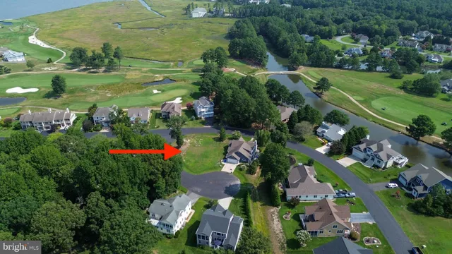 an aerial view of a houses with outdoor space and street view