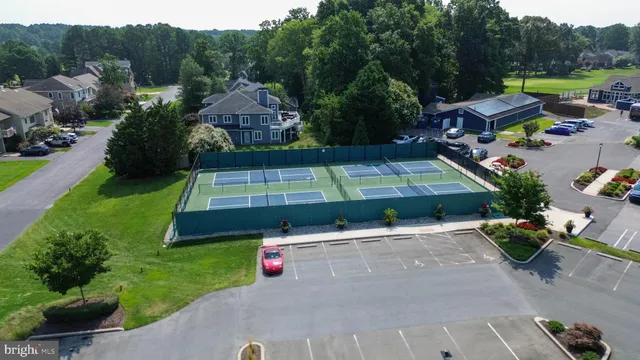 a view of a garden with sitting area