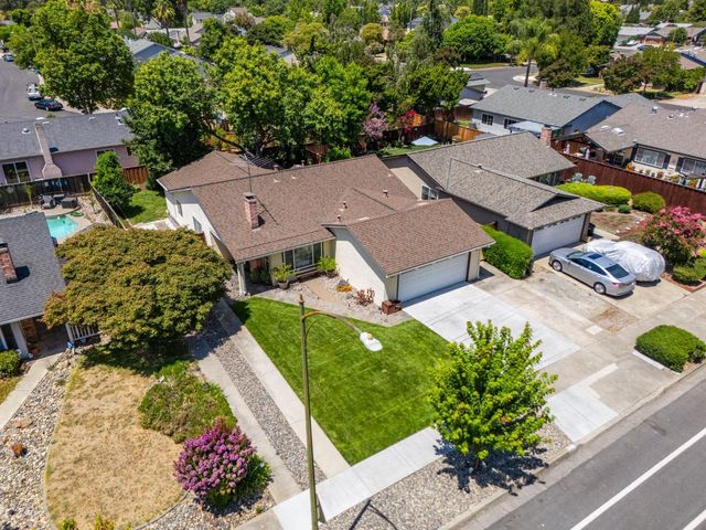 an aerial view of a house with garden