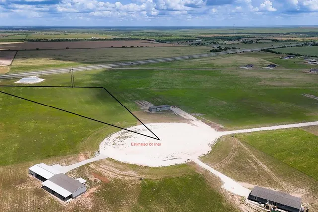a view of a pool in a yard