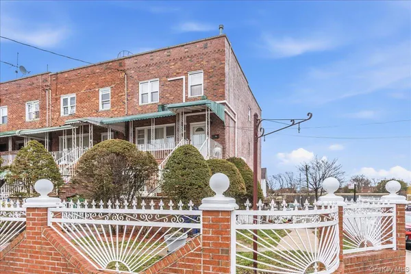 a front view of a building with street view