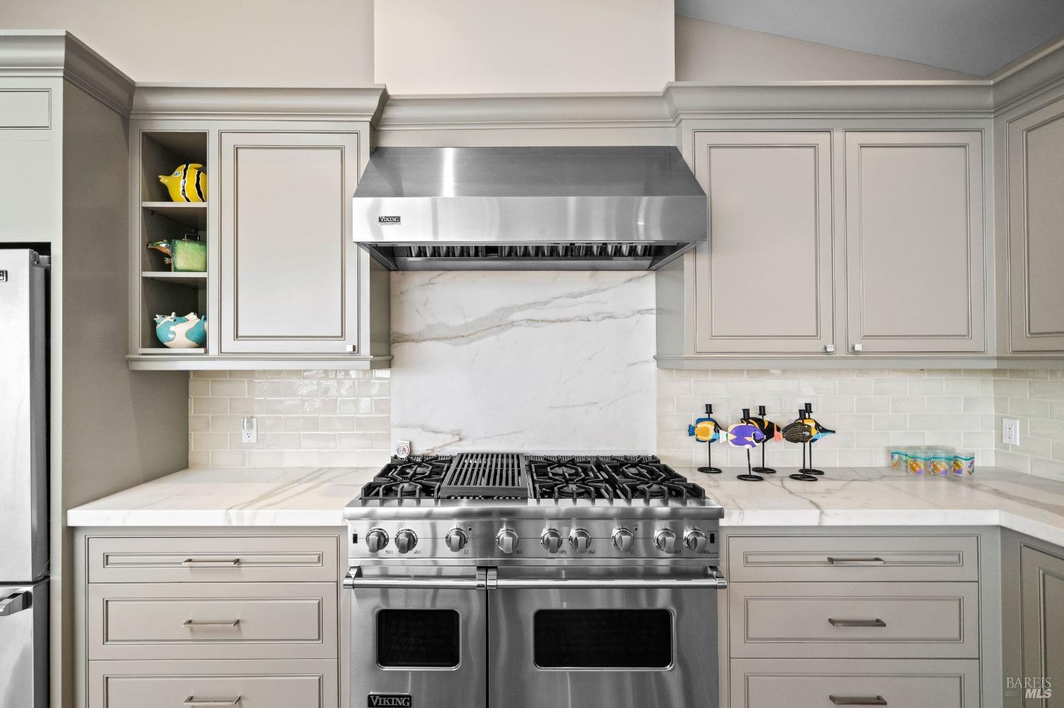 30 Eucalyptus Road Belvedere, CA 94920 - Photo 17 of 46 a white stove top oven sitting inside of a kitchen