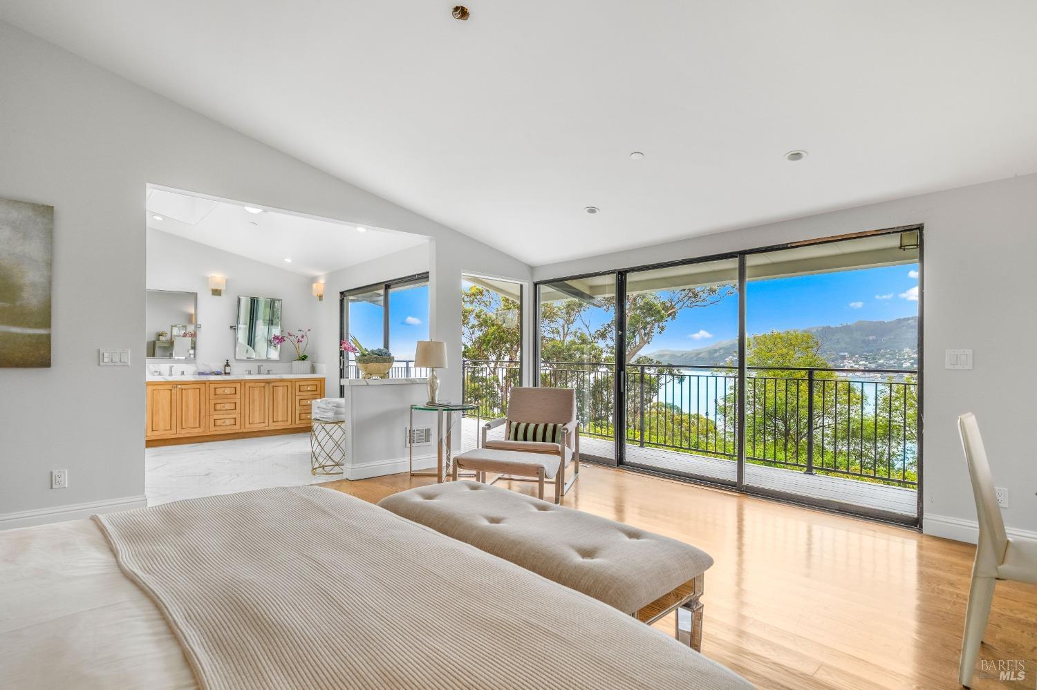 30 Eucalyptus Road Belvedere, CA 94920 - Photo 25 of 46 a living room with hardwood floor and a large window