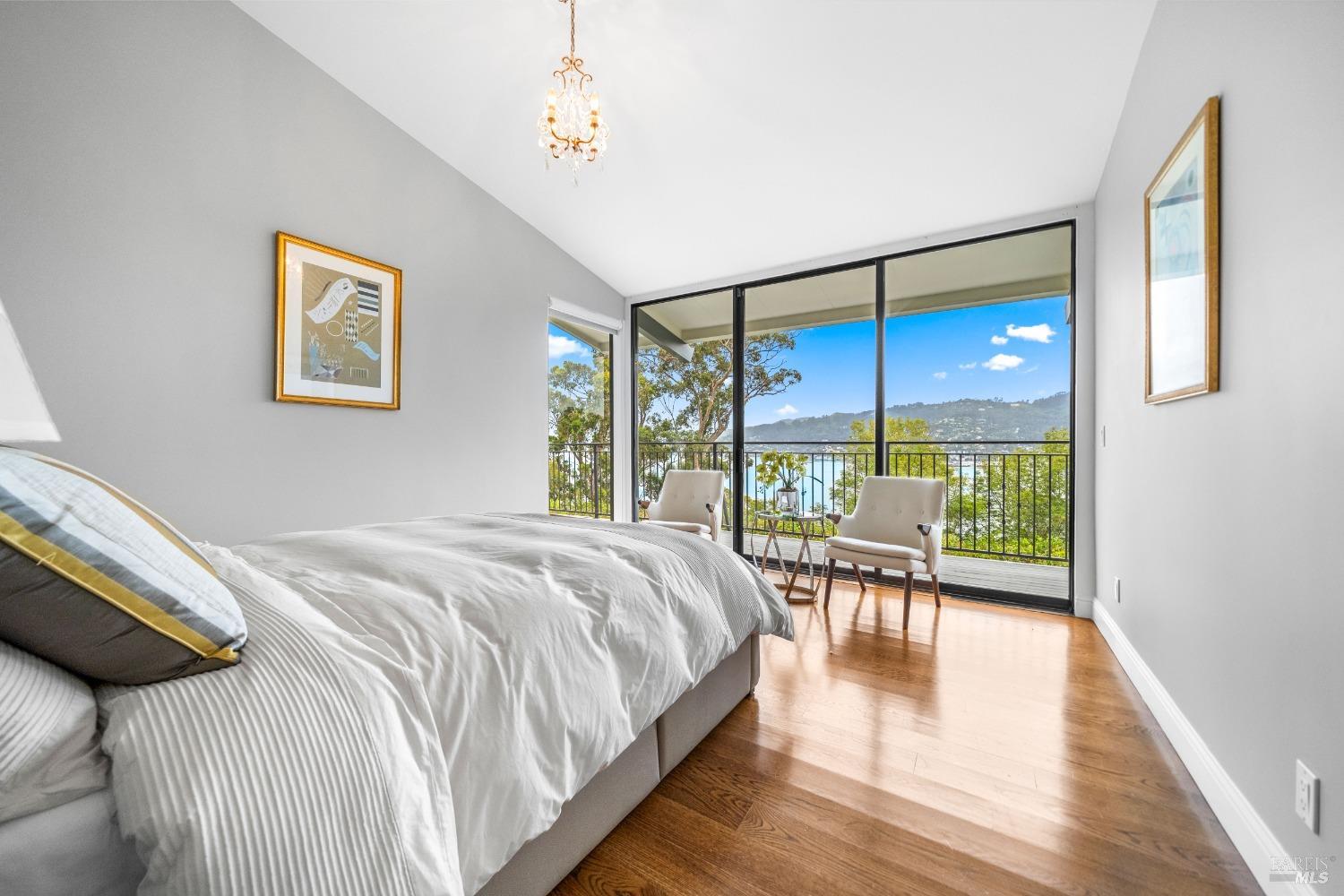 30 Eucalyptus Road Belvedere, CA 94920 - Photo 32 of 46 a bedroom with a bed and a table