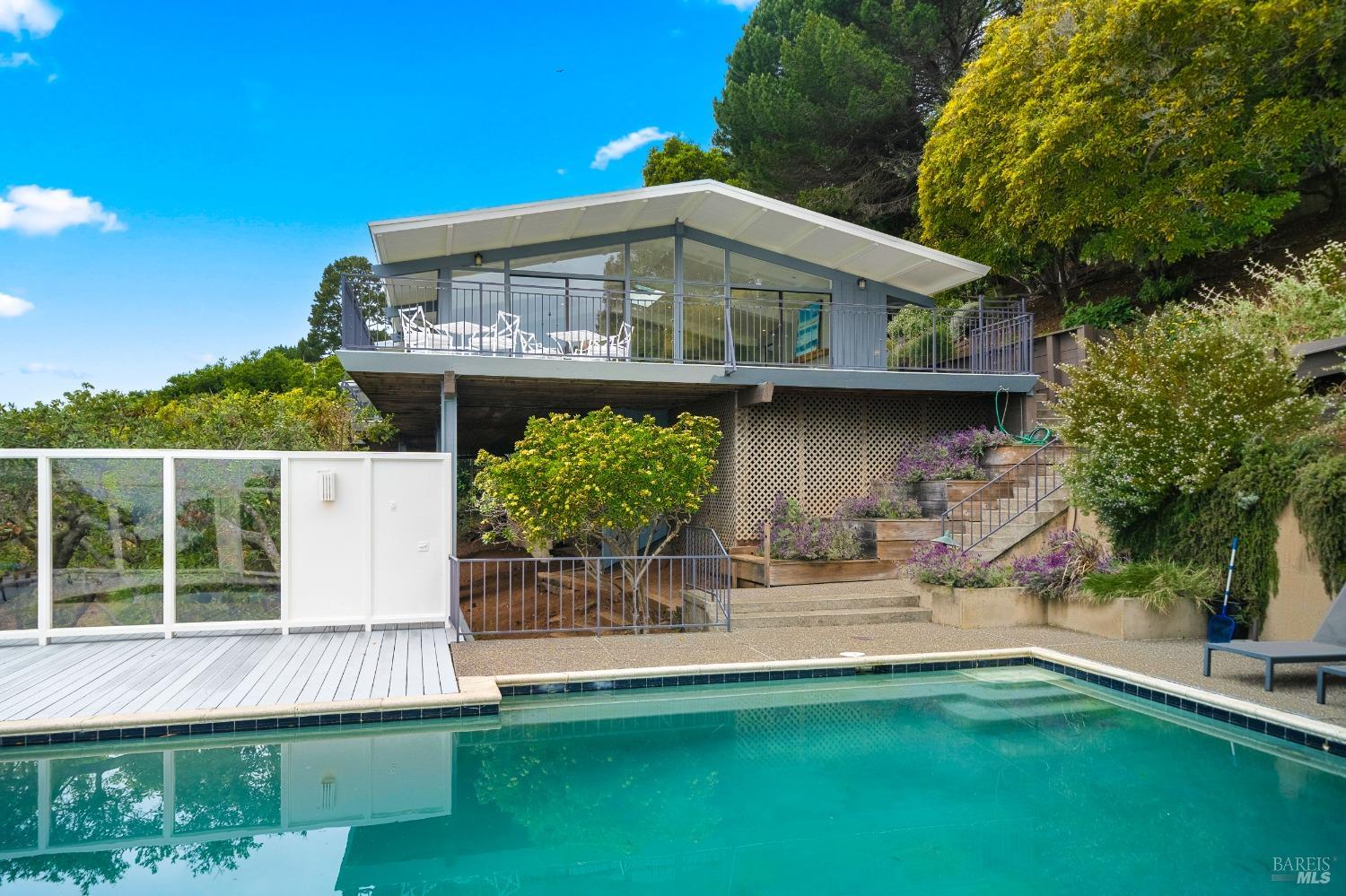 30 Eucalyptus Road Belvedere, CA 94920 - Photo 41 of 46 a view of a house with backyard and sitting area