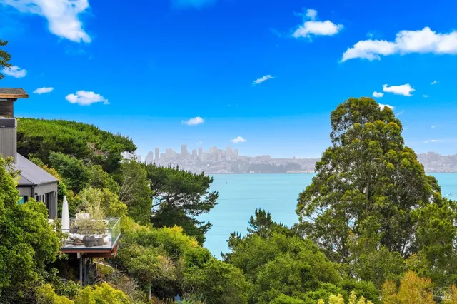 a sunset view with a lake