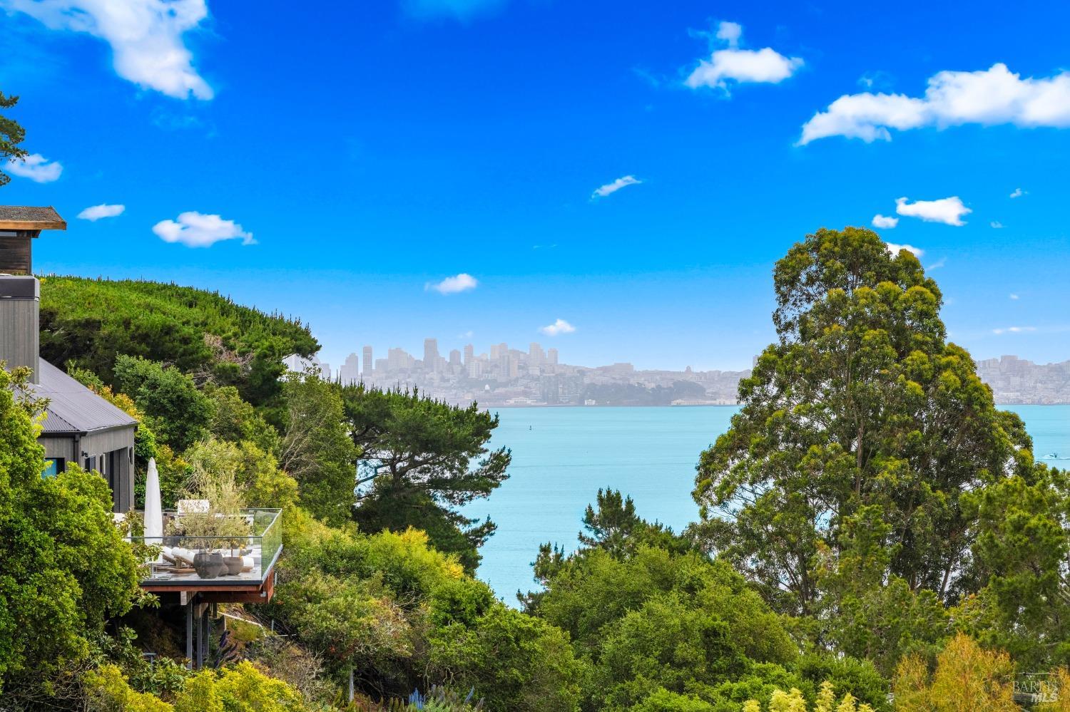 30 Eucalyptus Road Belvedere, CA 94920 - Photo 43 of 46 a sunset view with a lake