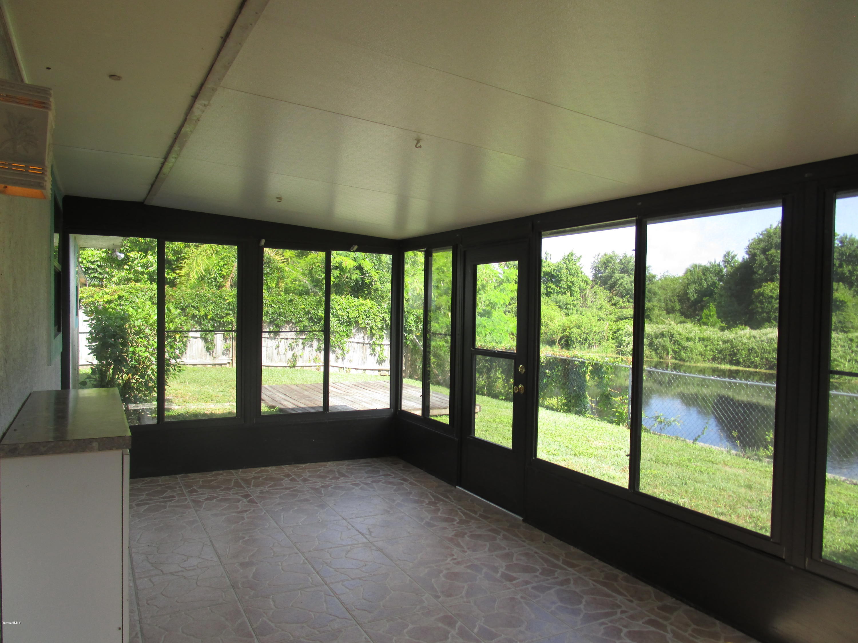 4075 Shuttle Court Merritt Island, FL 32953 - Photo 10 of 12 Screened Porch