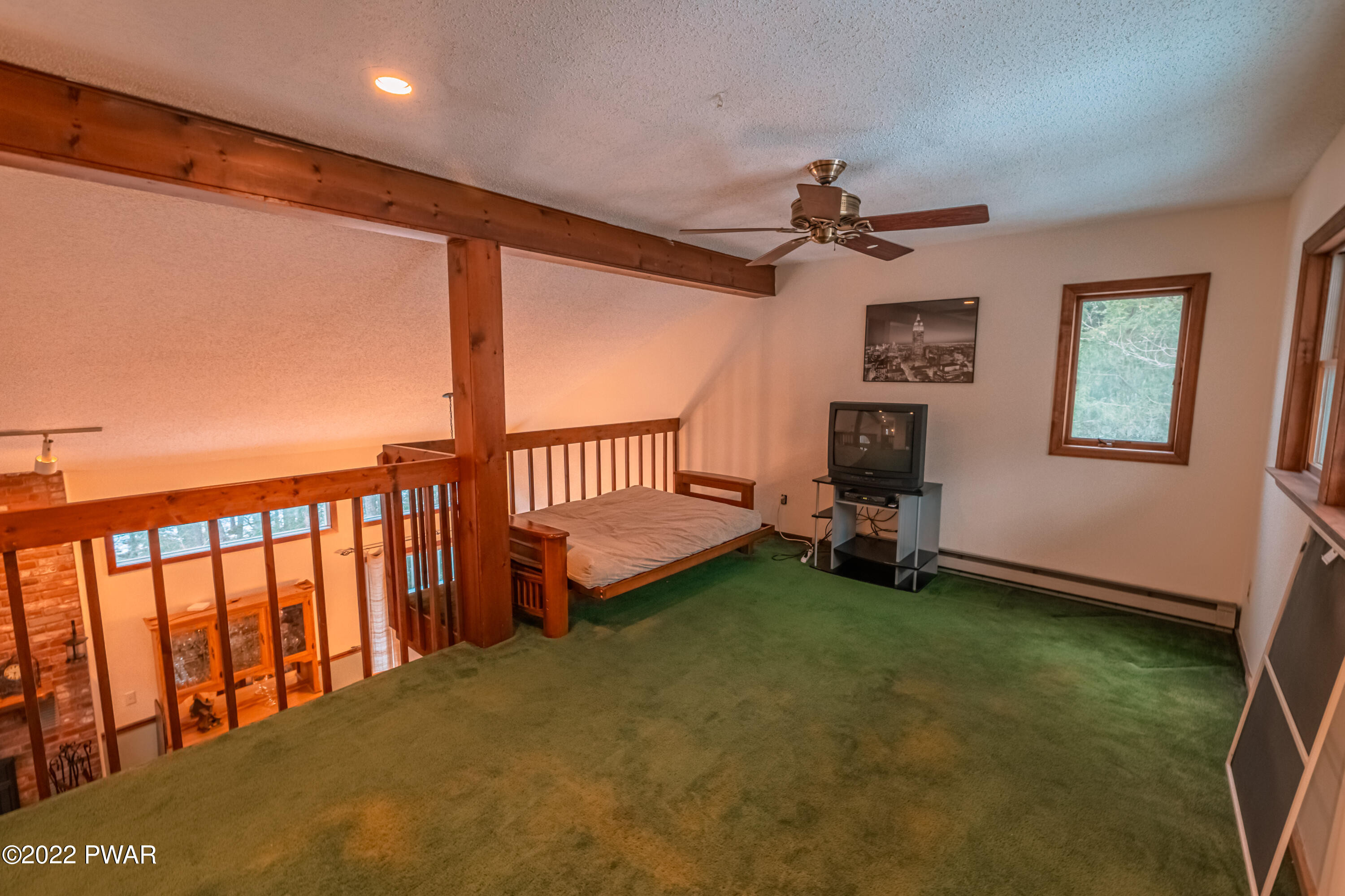 4141 Winchester Way Bushkill, PA 18324 - Photo 35 of 75 a view of a livingroom with furniture and a ceiling fan