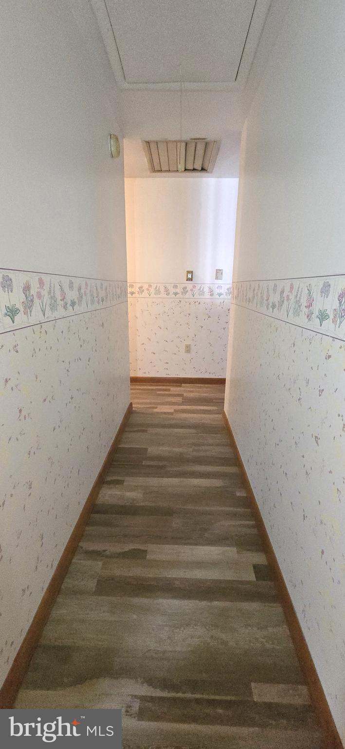 13682 Harbaugh Church Road Rouzerville, PA 17268 - Photo 33 of 42 Hall leading out of Primary pull-down attic stair