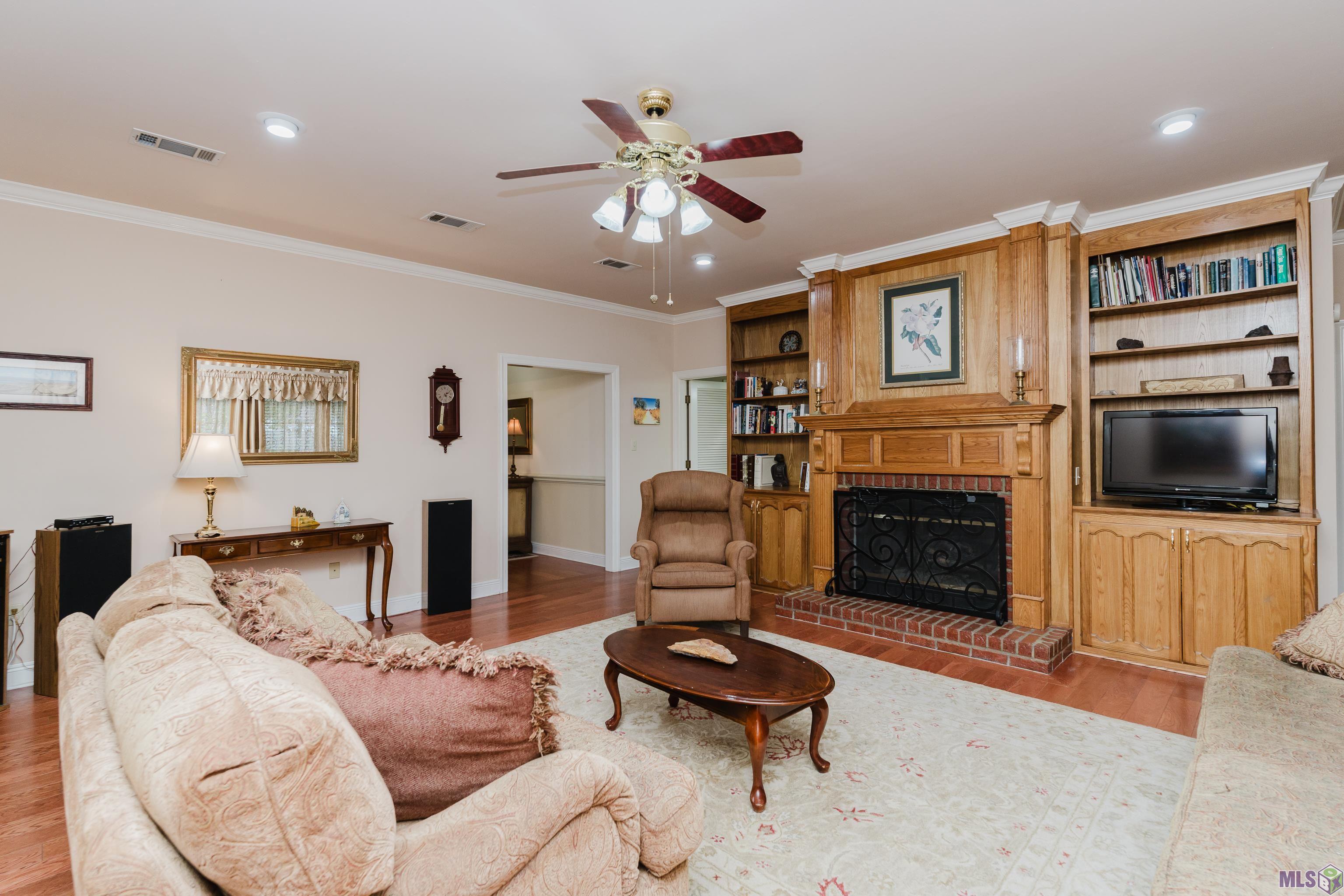 6057 Snowden Drive Baton Rouge, LA 70817 - Photo 12 of 33 Relax by the fireplace