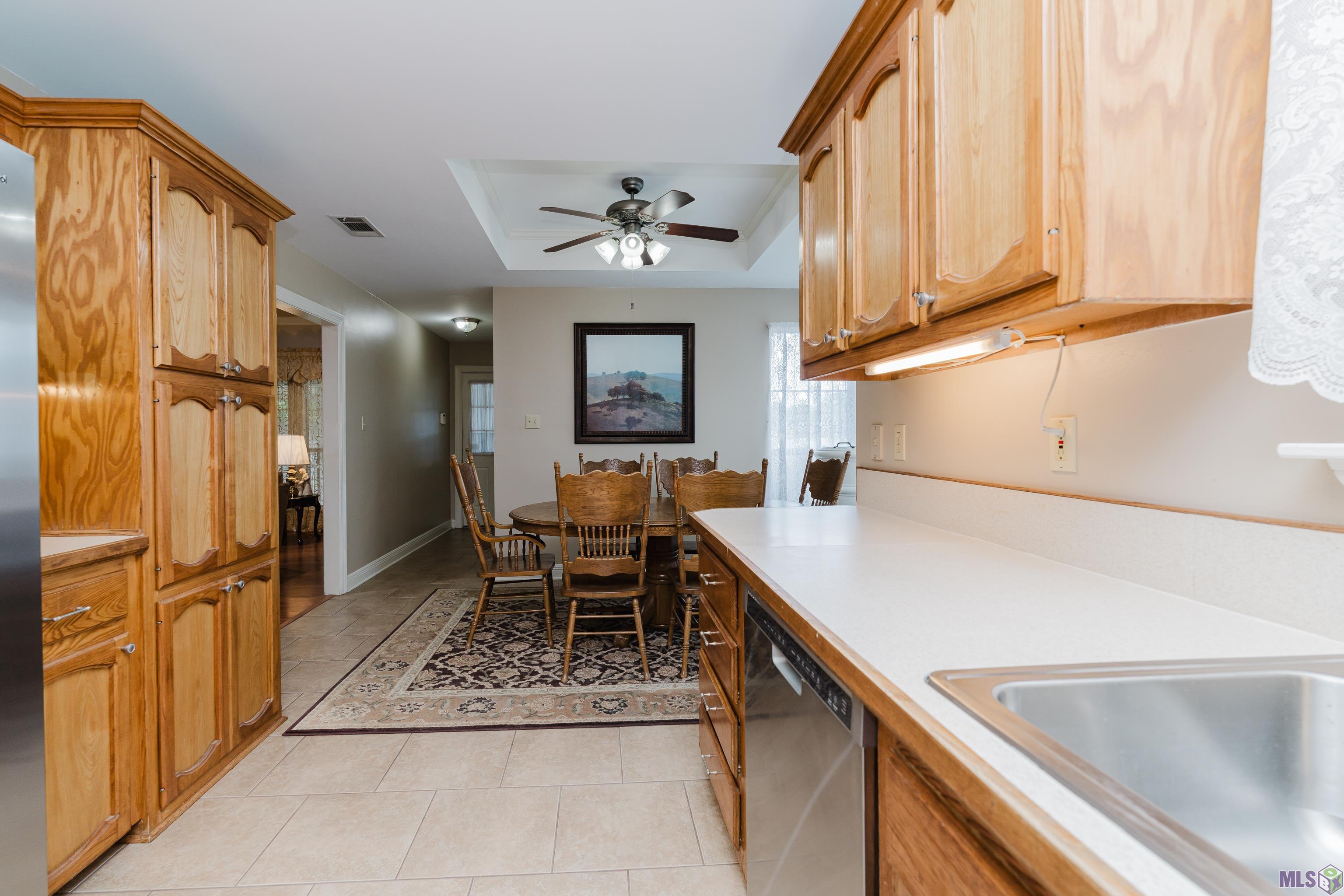 6057 Snowden Drive Baton Rouge, LA 70817 - Photo 18 of 33 Never miss a conversation while cooking.