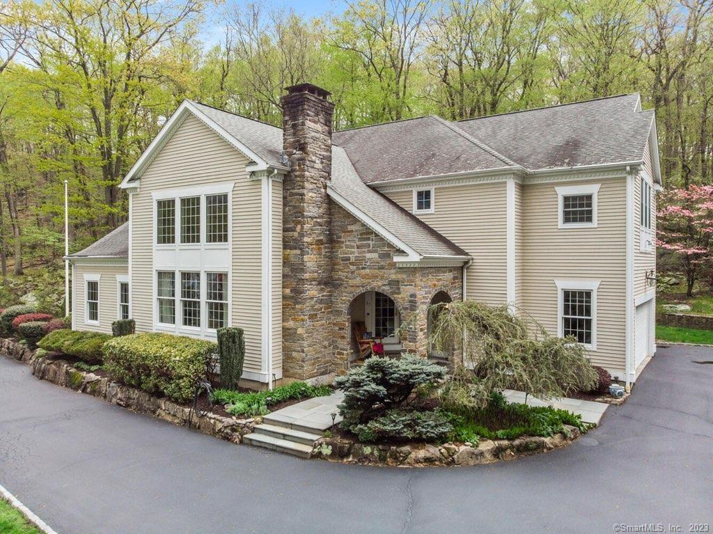 37 Osborn Farm Road Weston, CT 06883 - Photo 1 of 1 a house view with a garden space