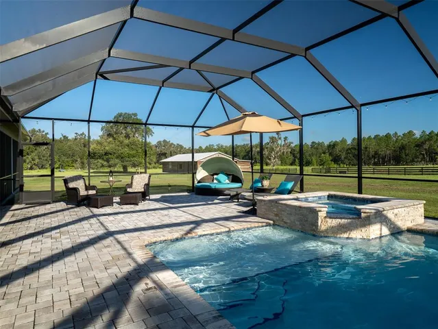 a view of a living room with furniture