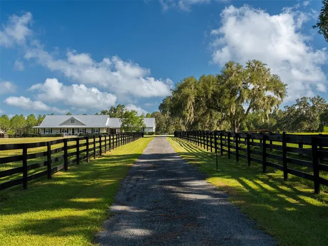 a view of swimming pool with a garden and stairs