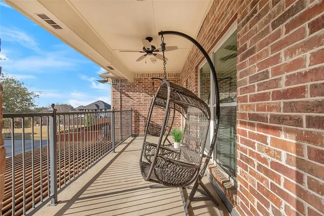 a view of balcony with wooden floor