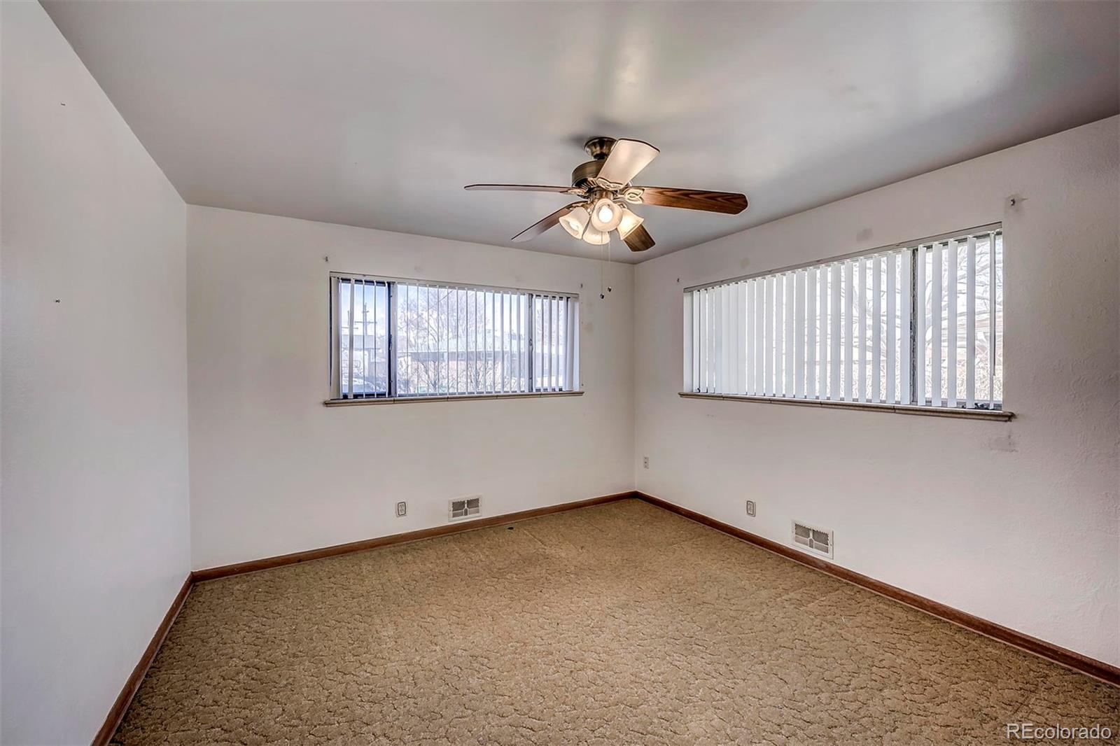 3880 Allison Street Wheat Ridge, CO 80033 - Photo 13 of 18 a view of an empty room with a window
