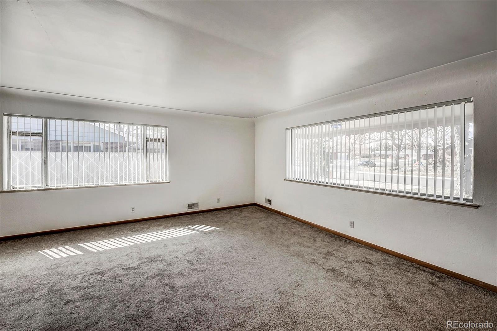 3880 Allison Street Wheat Ridge, CO 80033 - Photo 4 of 18 an empty room with a window