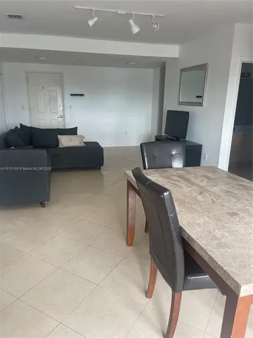 a bedroom with furniture and a bed