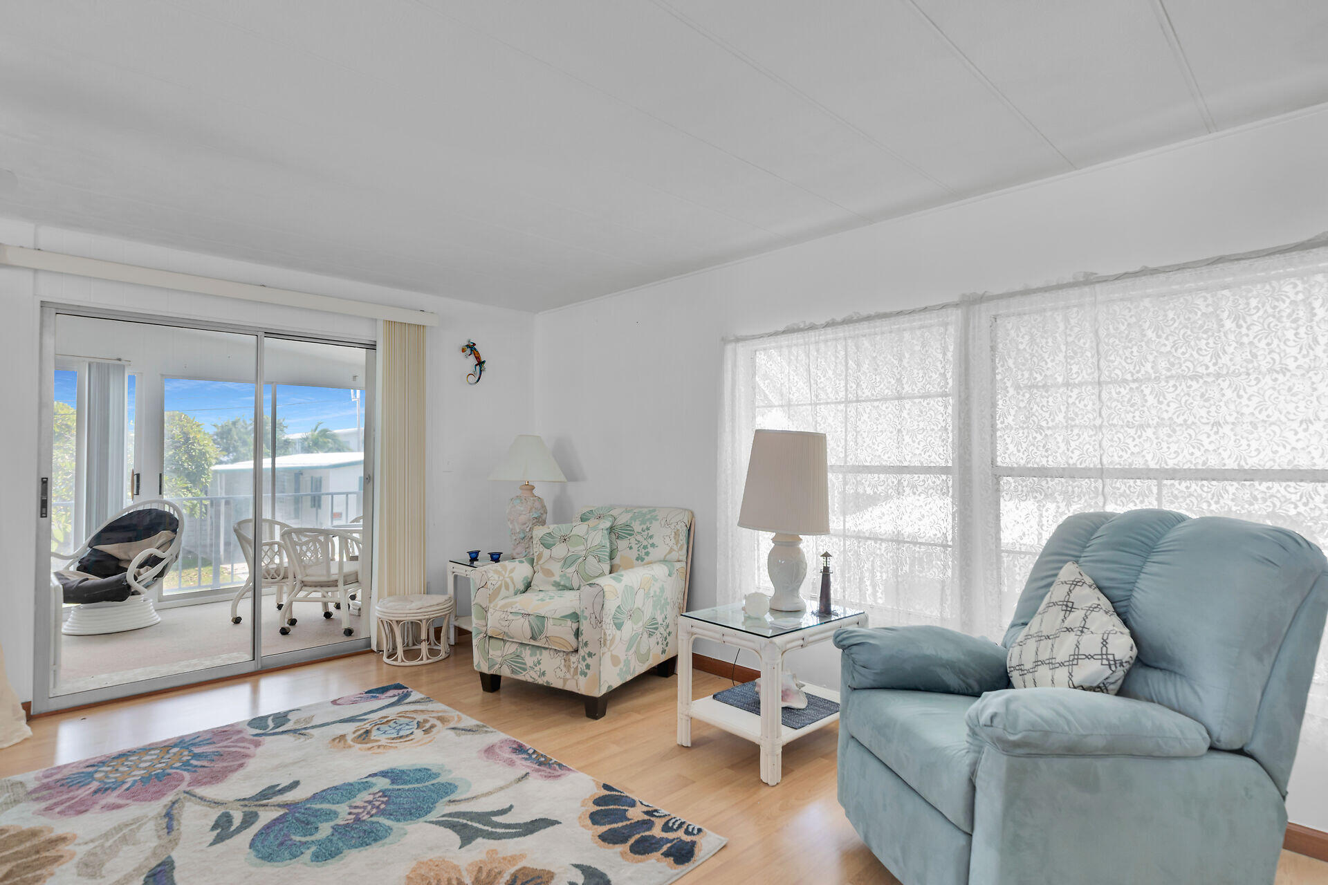 606 North Silver Circle Key Largo, FL 33037 - Photo 16 of 54 a living room with furniture and a large window