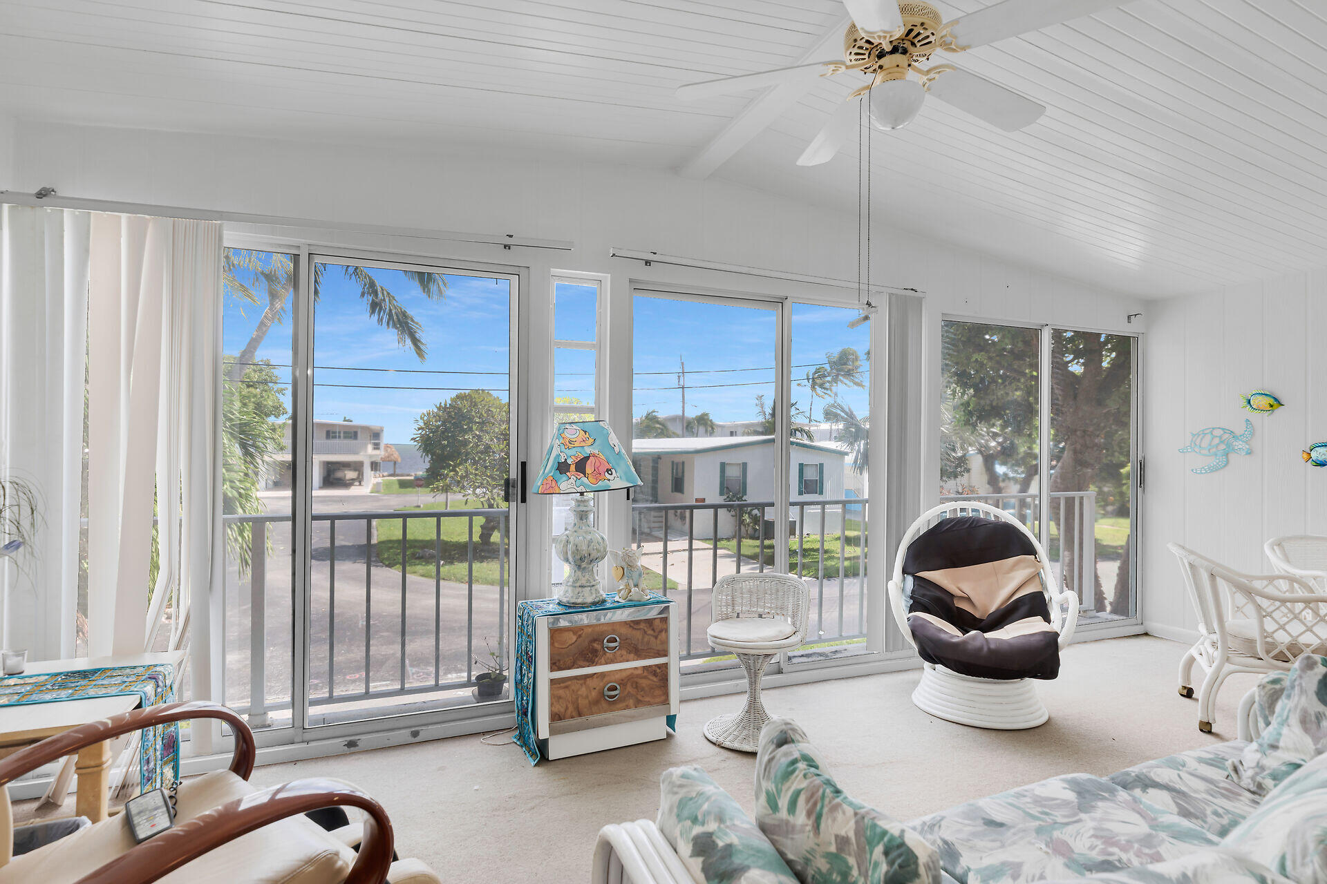 606 North Silver Circle Key Largo, FL 33037 - Photo 17 of 54 a room with furniture or chandelier and a large window