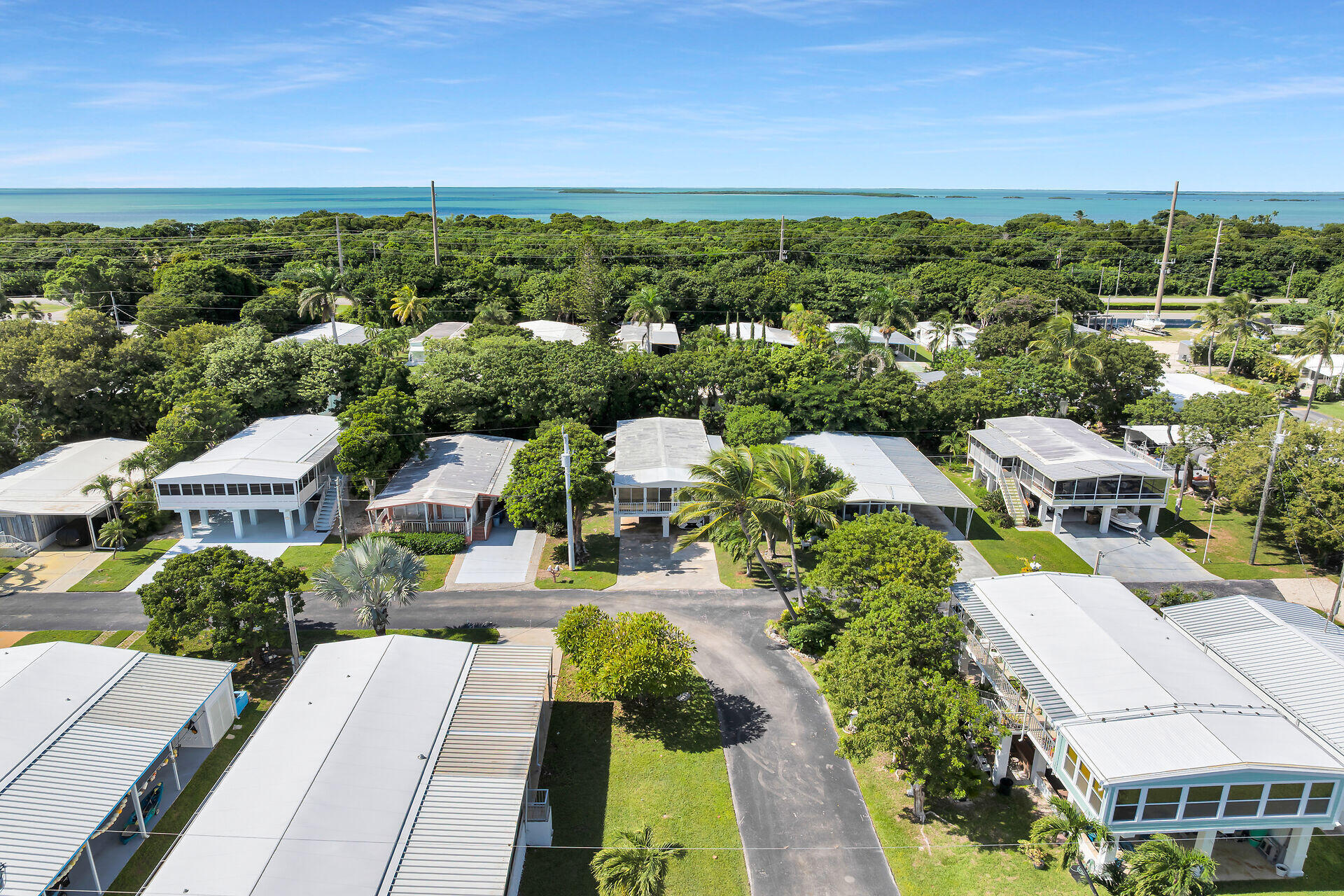 606 North Silver Circle Key Largo, FL 33037 - Photo 2 of 54 an aerial view of residential houses with outdoor space