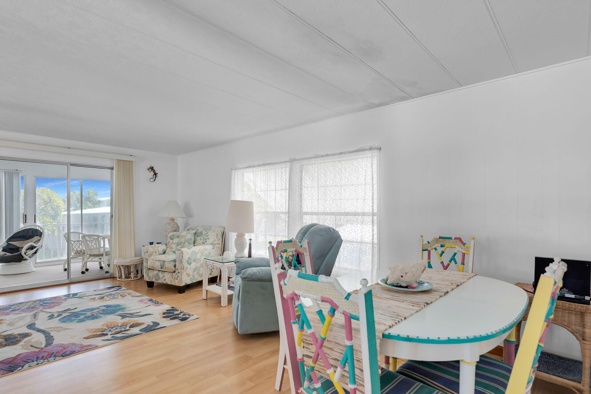 606 North Silver Circle Key Largo, FL 33037 - Photo 21 of 54 a living room with furniture and a window
