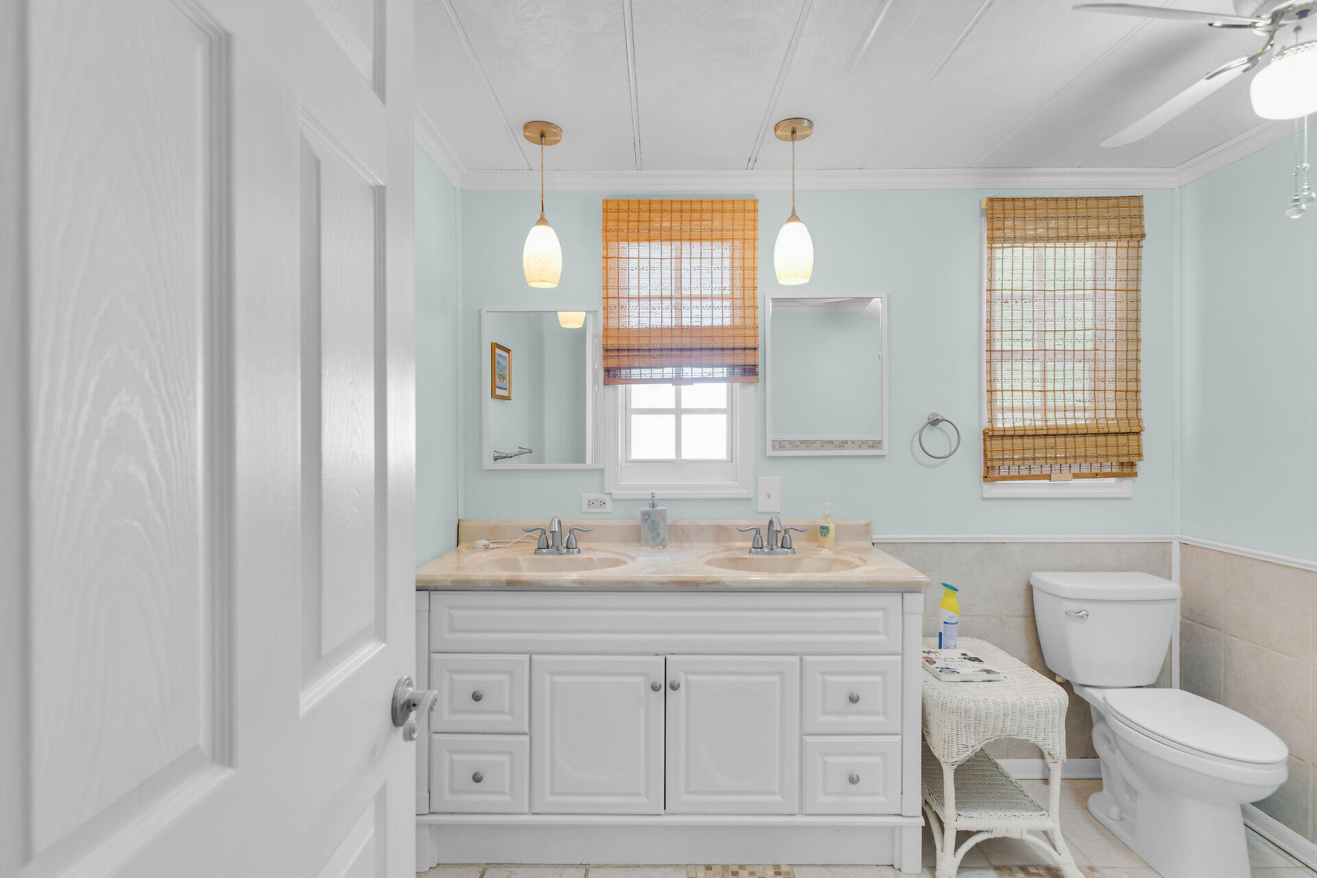 606 North Silver Circle Key Largo, FL 33037 - Photo 28 of 54 a bathroom with a sink toilet vanity and mirror