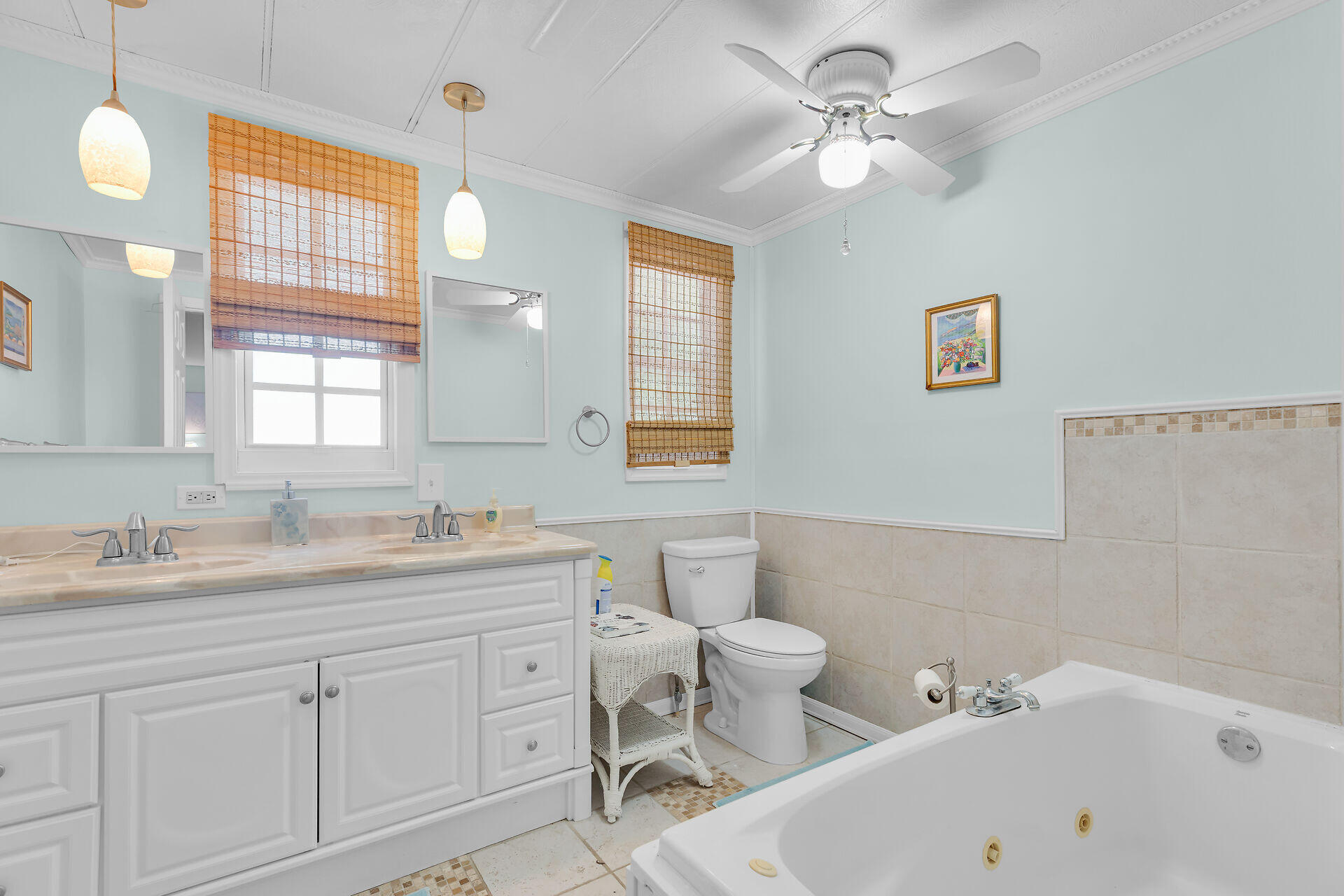 606 North Silver Circle Key Largo, FL 33037 - Photo 29 of 54 a bathroom with a sink a toilet and a bathtub