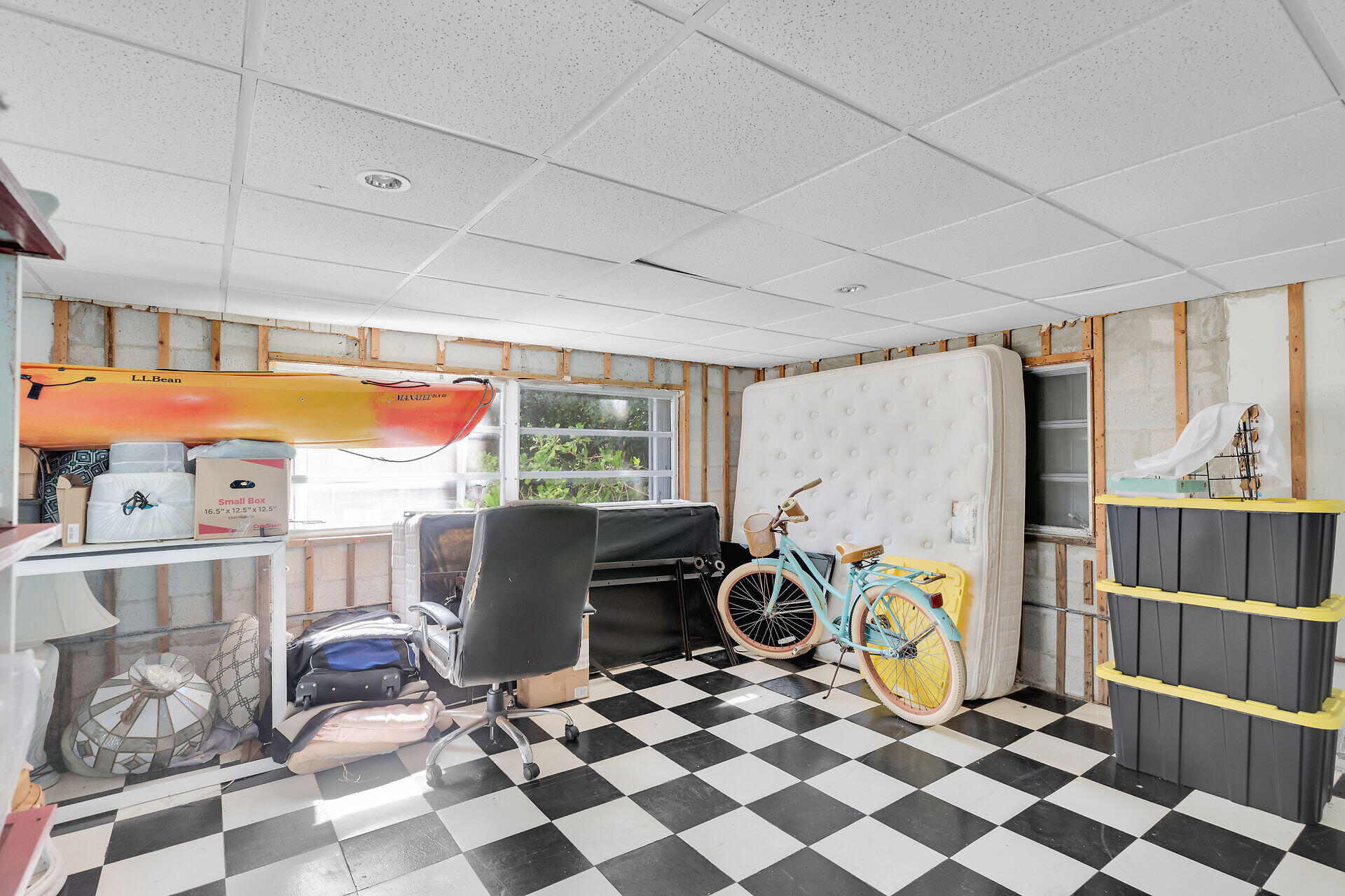 606 North Silver Circle Key Largo, FL 33037 - Photo 35 of 54 a room with furniture a rug and a window