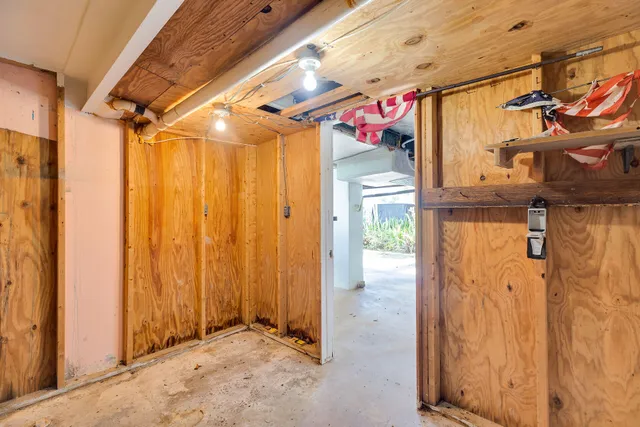 a view of a swimming pool and outdoor seating