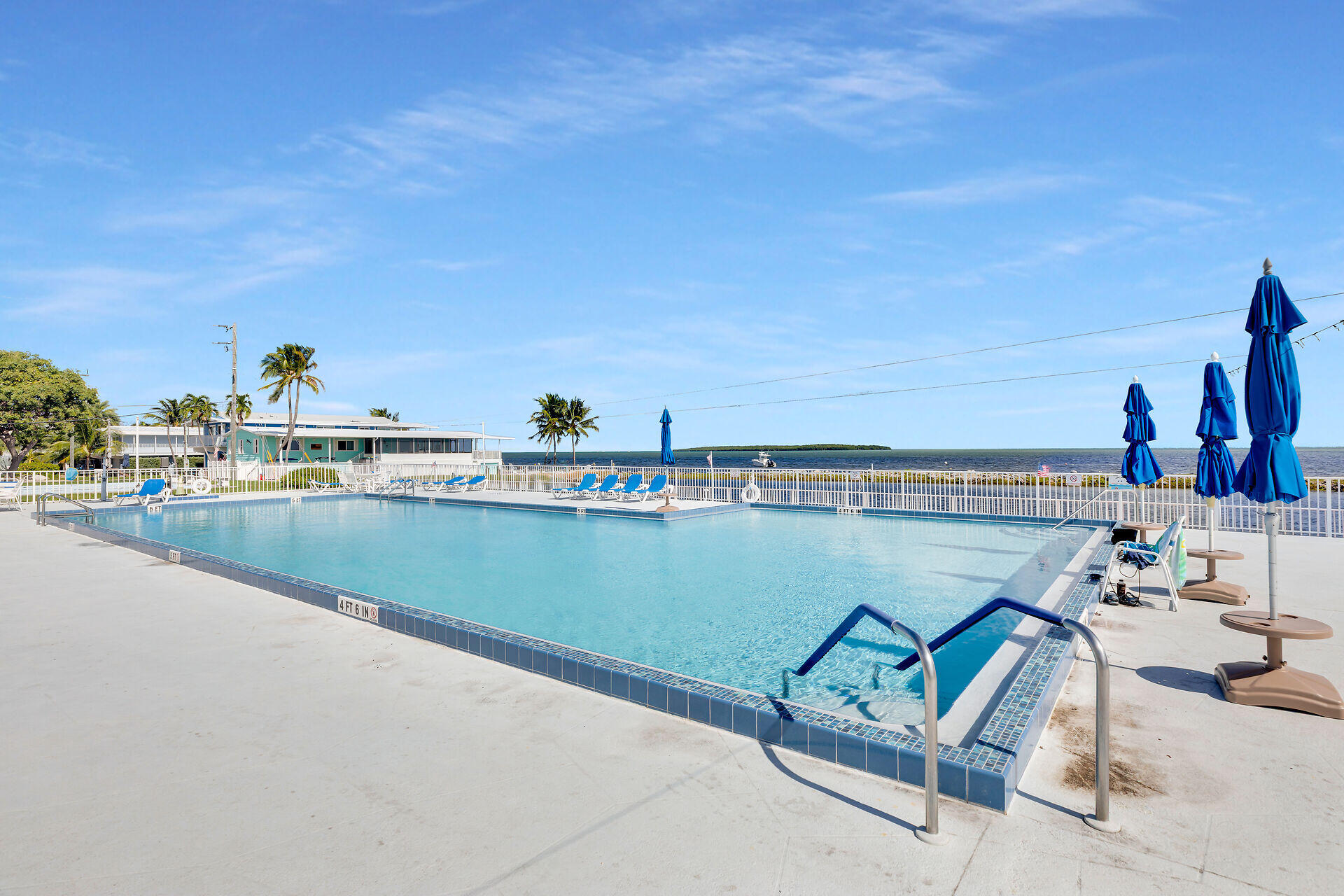 606 North Silver Circle Key Largo, FL 33037 - Photo 41 of 54 a view of swimming pool with outdoor seating and city view