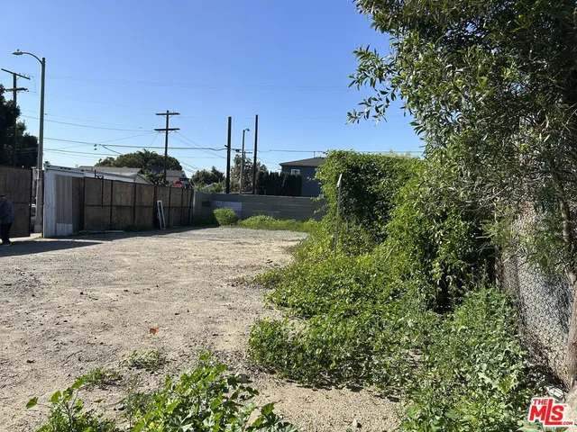 a view of a backyard of a house