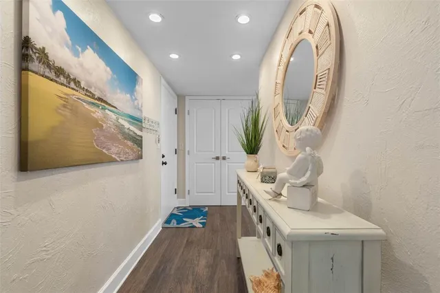 a front view of a building with glass windows and door