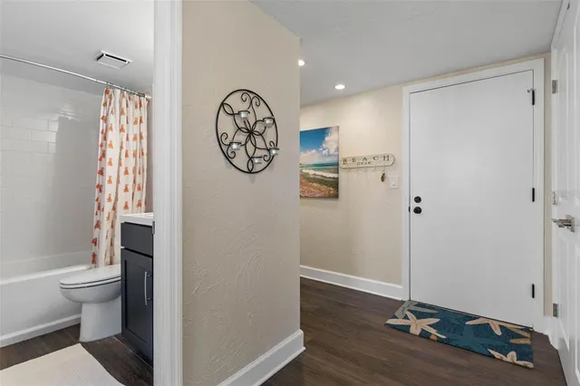 a front view of a building with garden