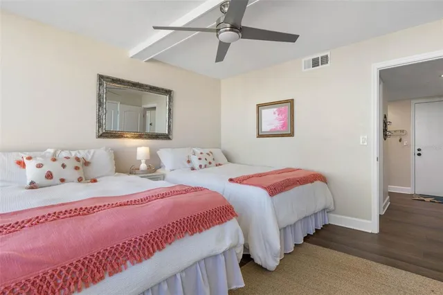 a kitchen with stainless steel appliances a refrigerator and a counter top space