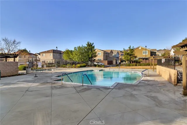 a view of yard and swimming pool