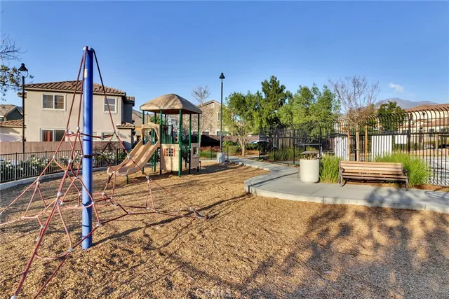 a view of a park with swings