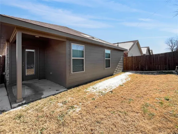 a view of backyard with a potted plant