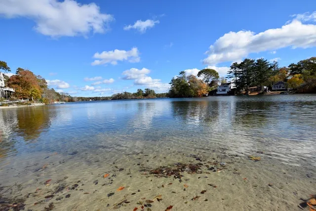 an aerial view of a house outdoor space and street view