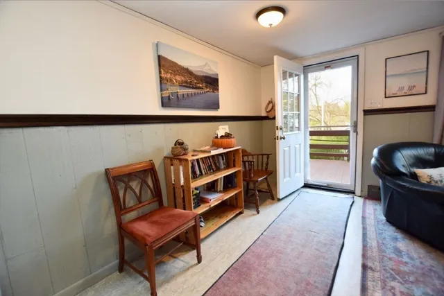 a bedroom with furniture and a window