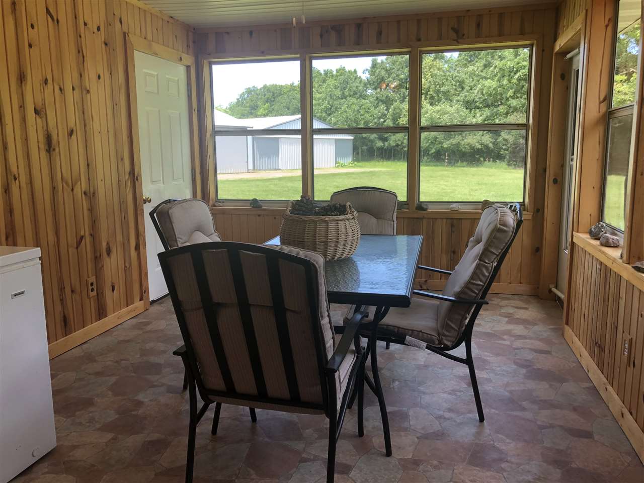 6652 North Cedar Road Forreston, IL 61030 - Photo 20 of 25 a view of a dining room with furniture window and outside view